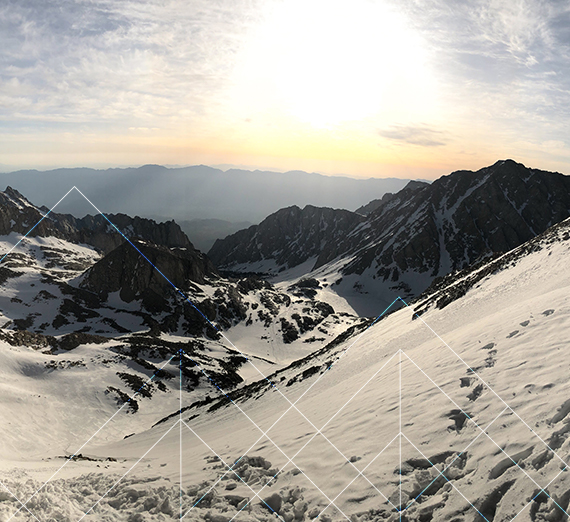 Jordy Jones poses with her laptop and her son on her lap.