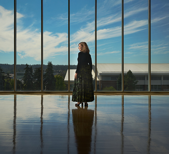 A climber from Gonzaga's Immersive Outdoor Learning program stand atop the Rocks of Sharon.